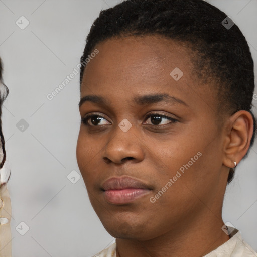 Neutral black young-adult female with short  black hair and brown eyes