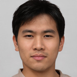 Neutral asian young-adult male with short  brown hair and brown eyes