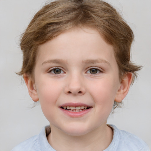 Joyful white child female with short  brown hair and brown eyes