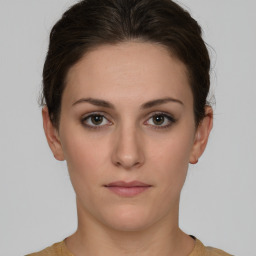 Neutral white young-adult female with short  brown hair and brown eyes