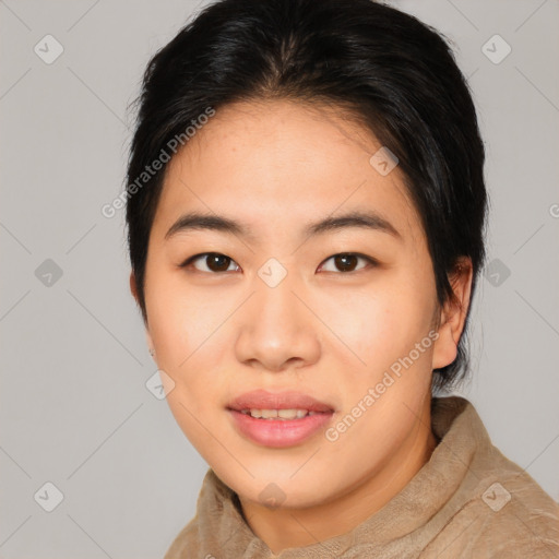 Joyful asian young-adult female with short  brown hair and brown eyes