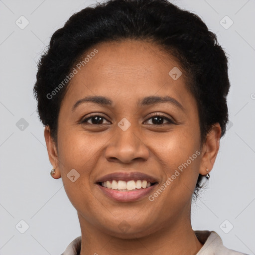 Joyful latino young-adult female with short  brown hair and brown eyes