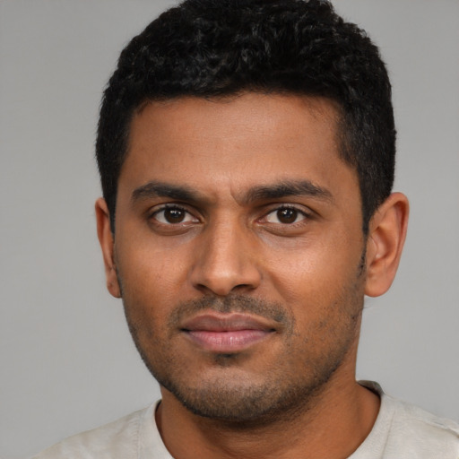 Neutral latino young-adult male with short  black hair and brown eyes
