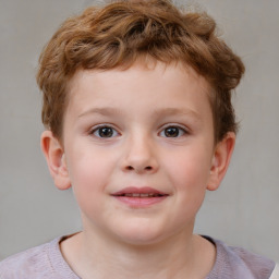 Joyful white child male with short  brown hair and brown eyes