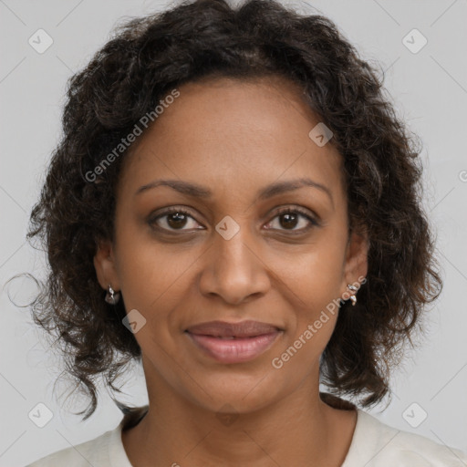 Joyful black young-adult female with medium  brown hair and brown eyes