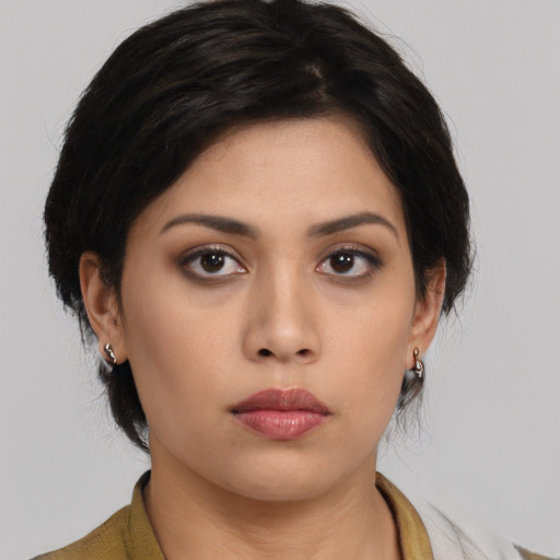 Neutral asian young-adult female with medium  black hair and brown eyes