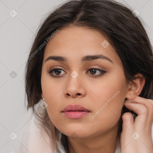 Neutral white young-adult female with medium  brown hair and brown eyes