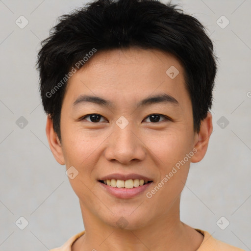 Joyful asian young-adult male with short  brown hair and brown eyes
