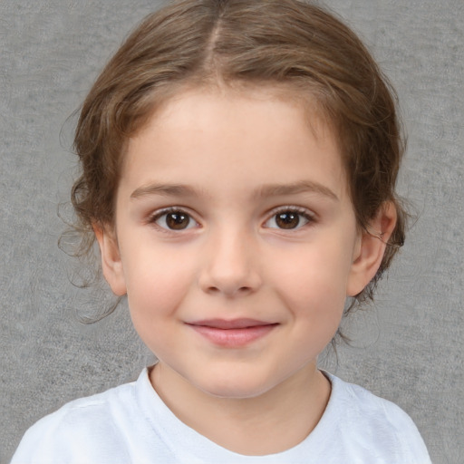 Joyful white child female with medium  brown hair and brown eyes