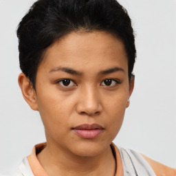 Neutral asian young-adult female with short  brown hair and brown eyes