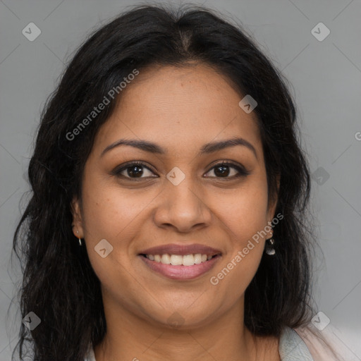 Joyful latino young-adult female with long  brown hair and brown eyes