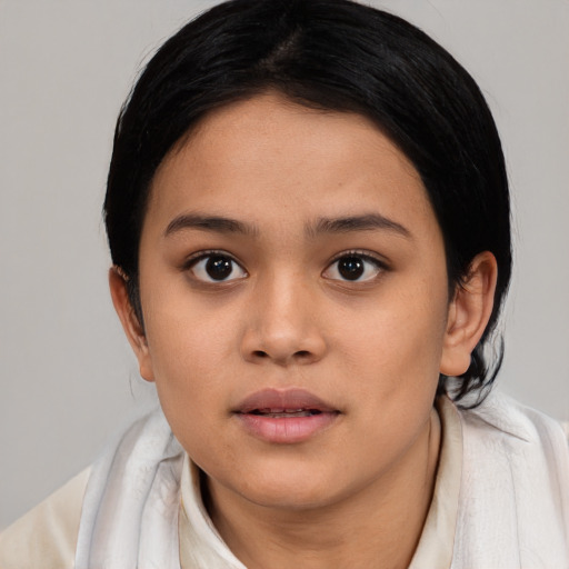 Neutral white young-adult female with medium  black hair and brown eyes
