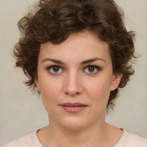 Neutral white young-adult female with medium  brown hair and green eyes