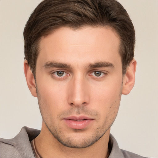 Neutral white young-adult male with short  brown hair and brown eyes