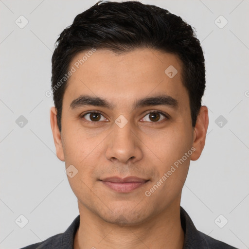 Joyful latino young-adult male with short  black hair and brown eyes