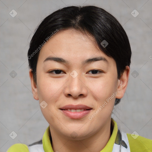 Joyful asian young-adult female with short  brown hair and brown eyes