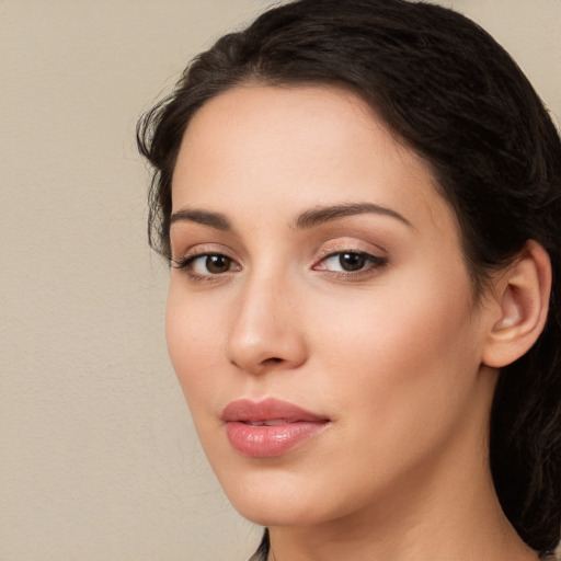 Neutral white young-adult female with long  brown hair and brown eyes