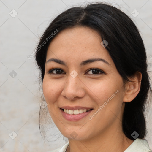 Joyful asian young-adult female with medium  brown hair and brown eyes