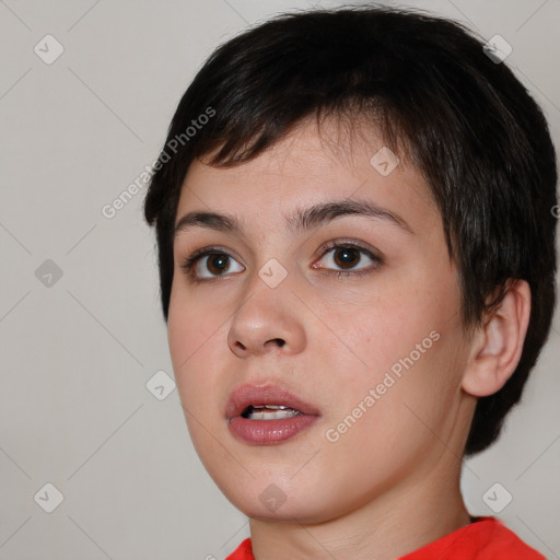 Neutral white young-adult female with short  brown hair and brown eyes