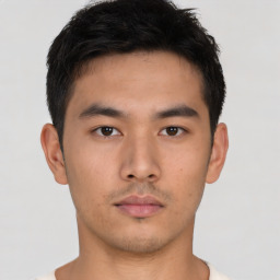 Neutral asian young-adult male with short  brown hair and brown eyes