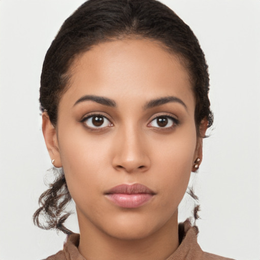 Neutral latino young-adult female with short  brown hair and brown eyes