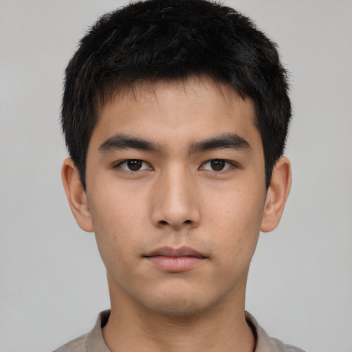 Neutral asian young-adult male with short  black hair and brown eyes