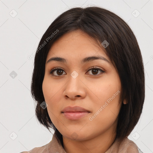 Neutral latino young-adult female with medium  brown hair and brown eyes