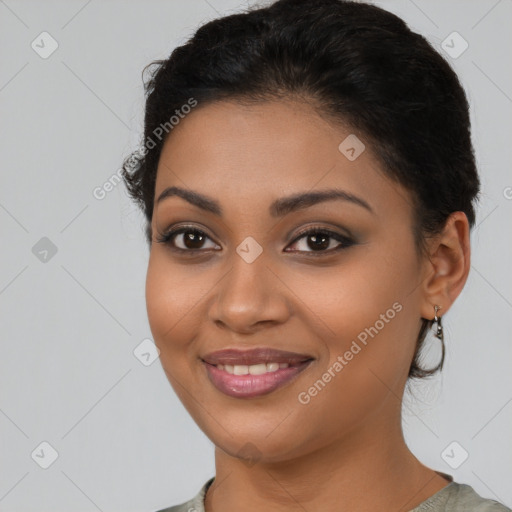 Joyful latino young-adult female with long  brown hair and brown eyes