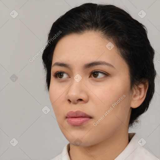 Neutral white young-adult female with medium  brown hair and brown eyes