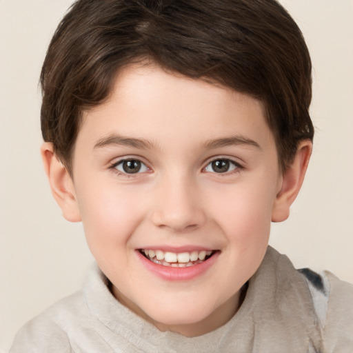 Joyful white child female with short  brown hair and brown eyes