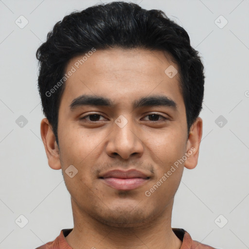 Joyful asian young-adult male with short  black hair and brown eyes