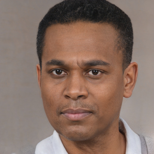 Neutral black young-adult male with short  black hair and brown eyes