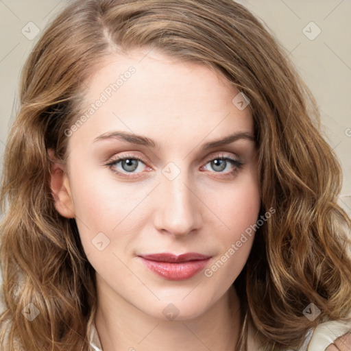 Joyful white young-adult female with long  brown hair and blue eyes