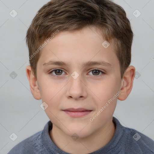 Joyful white child male with short  brown hair and brown eyes