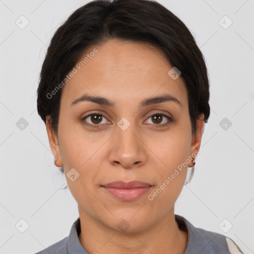 Joyful latino young-adult female with short  brown hair and brown eyes