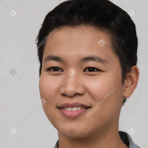 Joyful asian young-adult male with short  brown hair and brown eyes