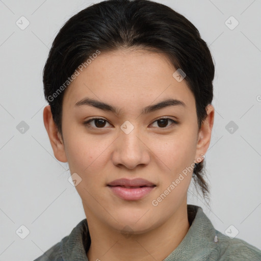 Joyful asian young-adult female with medium  brown hair and brown eyes