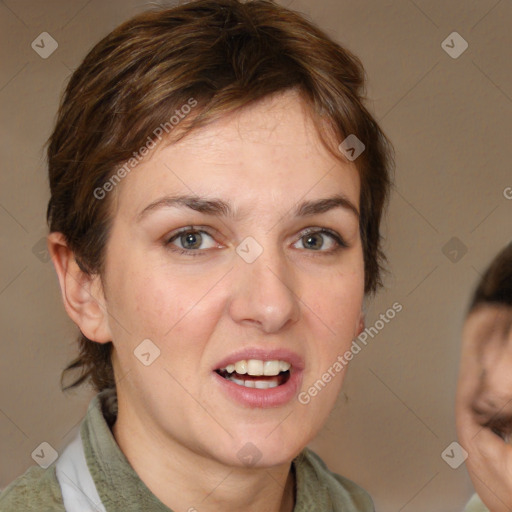 Joyful white young-adult female with medium  brown hair and grey eyes