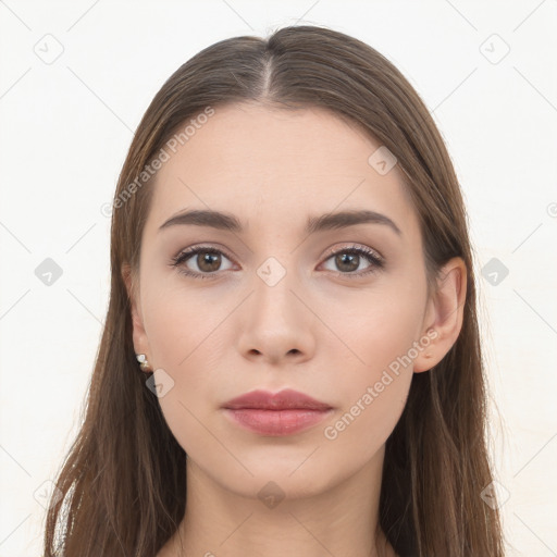 Neutral white young-adult female with long  brown hair and brown eyes