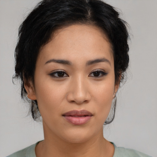 Neutral latino young-adult female with medium  black hair and brown eyes