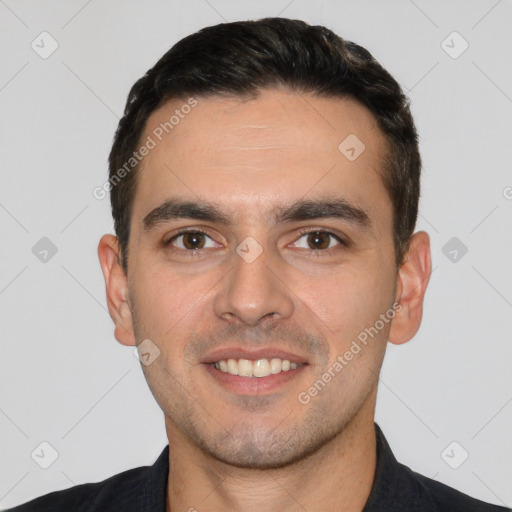 Joyful white young-adult male with short  black hair and brown eyes