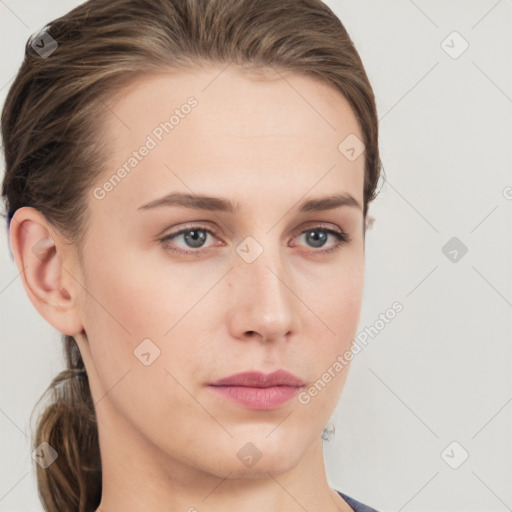 Neutral white young-adult female with medium  brown hair and grey eyes