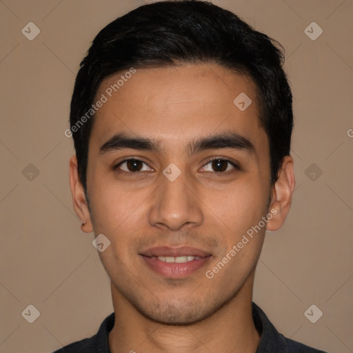 Joyful latino young-adult male with short  black hair and brown eyes