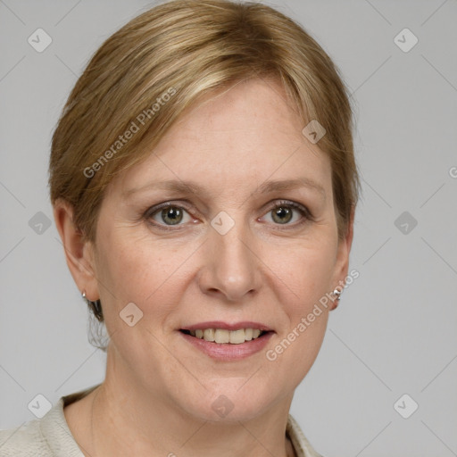 Joyful white adult female with short  brown hair and grey eyes