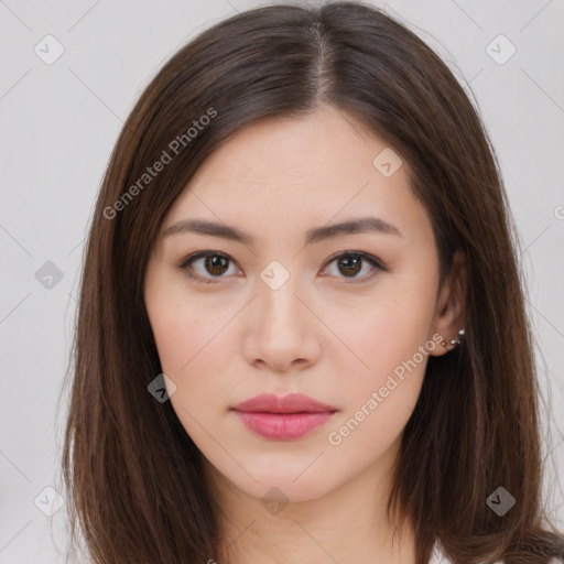 Neutral white young-adult female with long  brown hair and brown eyes