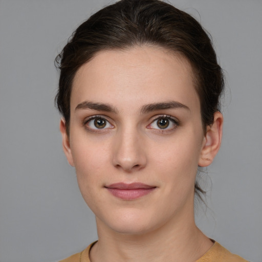 Neutral white young-adult female with medium  brown hair and brown eyes