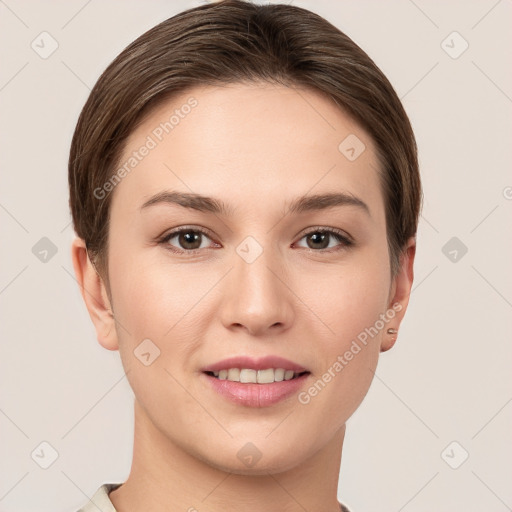 Joyful white young-adult female with short  brown hair and brown eyes