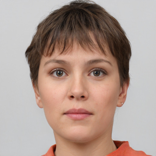 Neutral white young-adult female with short  brown hair and brown eyes