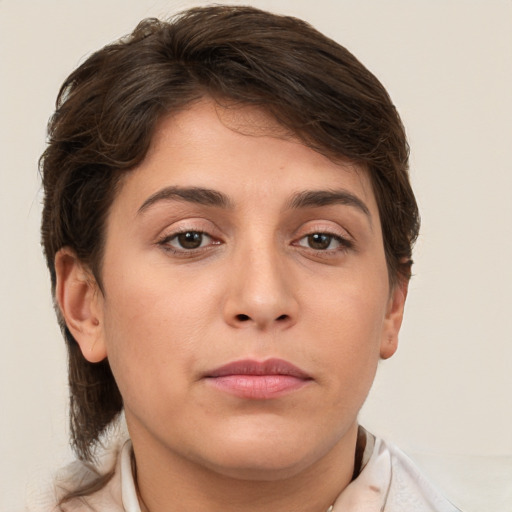 Neutral white young-adult female with short  brown hair and brown eyes