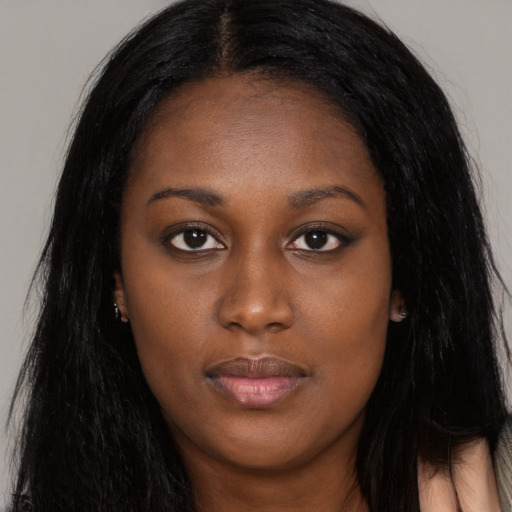 Joyful asian young-adult female with long  black hair and brown eyes
